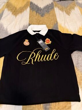 Rhude Men’s Black Polo Top with White Collar and Gold Embroidery